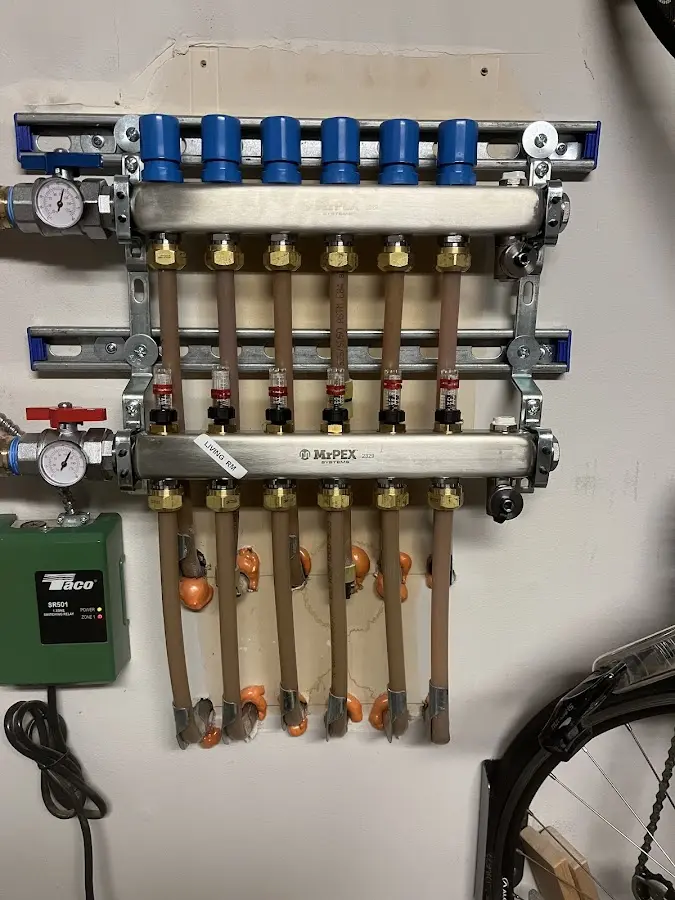 Plumber performing Water Heater Repair at a residential property in Lynchburg, Moore County